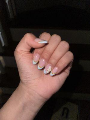 Beautiful nails! Almond French with a flower design