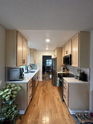 Gallery Kitchen, Natural Finish on Maple, Quartz Countertop, Stainless Appliances/Sink with Matte Black Hardware The Cabs/CT are Dave's