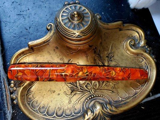 The Roman Candle. A fantastic pen from Birmingham Pens (the pen stand could use some polish, but the pen looks great!)