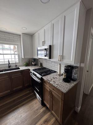Upgraded countertops cabinets and tiling