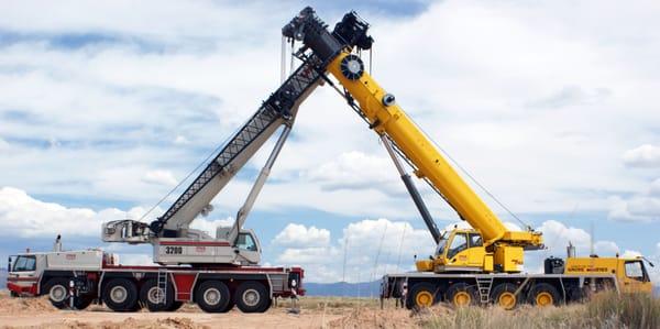 Crane Rental - Crane Service, Inc crossing booms.