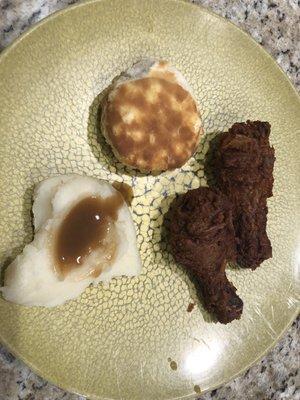 Burnt chicken drum sticks, mashed potatoes with gravy and a hard biscuit. I tried to soften the biscuit with honey. No such luck.