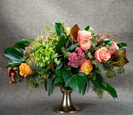 Our floral designs are carefully crafted using high end, unusual flowers with the utmost care for composition and texture.