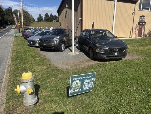 ECOMAX LLC front office door with the lot view.