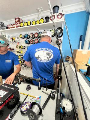 Dewayne setting up a rod for a customer.