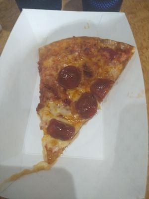 Slice of Pepperoni pizza