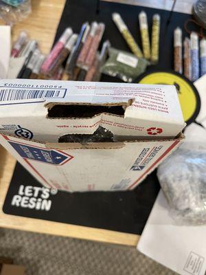 There was no tape just folded edges used to mail.