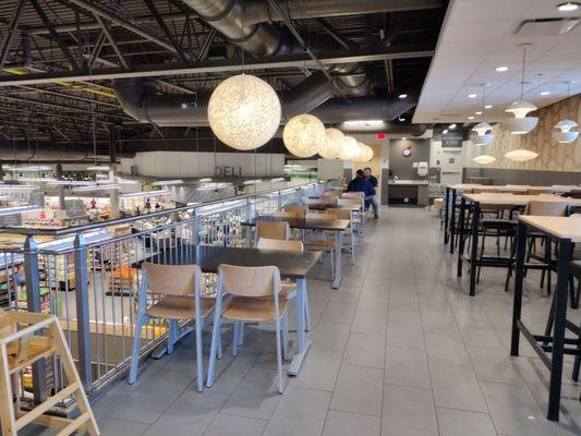 Big dining area on the balcony overlooking Publix, with a smaller outdoor balcony. Restroom on the balcony for hand washing.