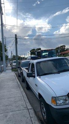 Car being towed back to to dealer