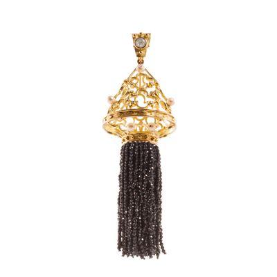 The shiny black, spinel tassel and the bale can be switched out form diamonds and jet black to one of fine seed pearls as in the open cone