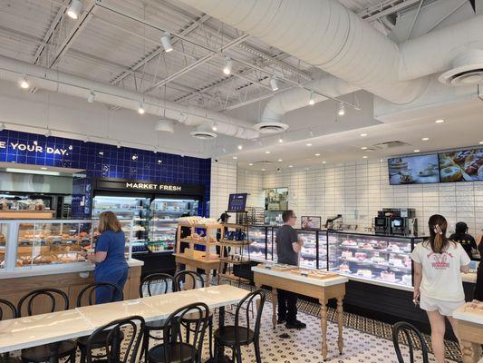 Sliced and full cakes in the display cases up front