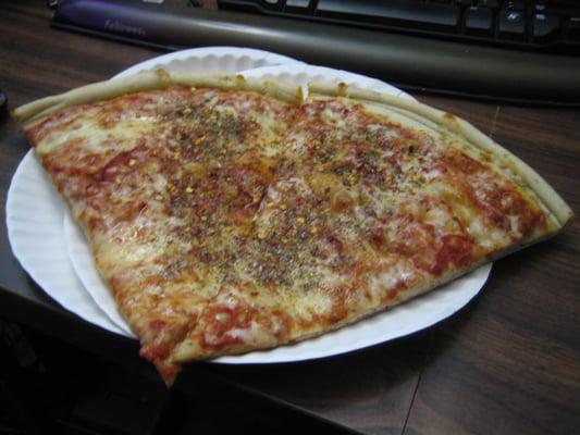 $1 slice with toppings. Free toppings of course cause that's how we do in the hood!