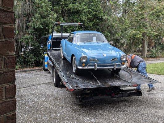 Strapped her down securely and even padded the strap across the engine cover