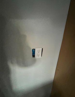 Outlook cover placed without fixing drywall hole.