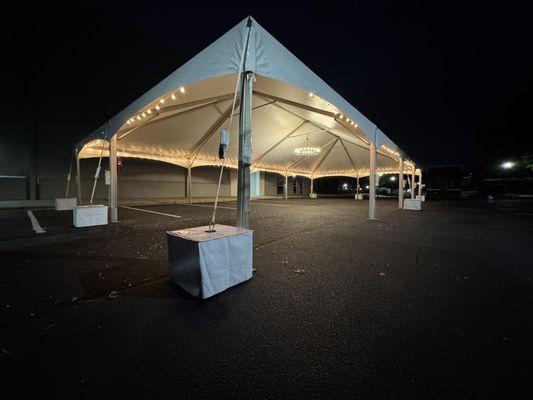 30X60 Future Trac Tent with market lights around perimeter and a chandelier in the center.