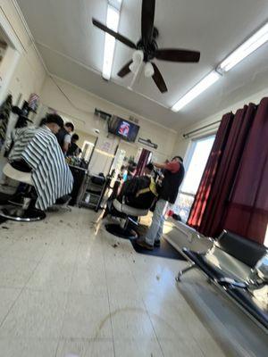Barbers working hard and busy today