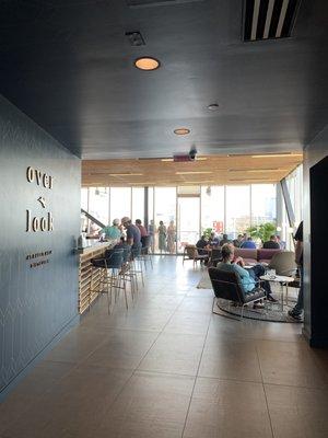 View from elevators. Large indoor space where they also do post-tour tastings and also a wraparound balcony.
