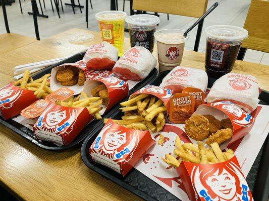 14 dollars with tax included! We got peach soda, pineapple soda, grape soda, chocolate frosty and burger, fries, spicy chicken nuggets.