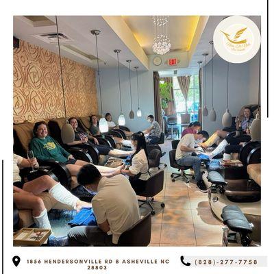 The bridal group is enjoying pedi-mani for the bride's special day in a spacious, airy space that accommodates many people at once in Noire.