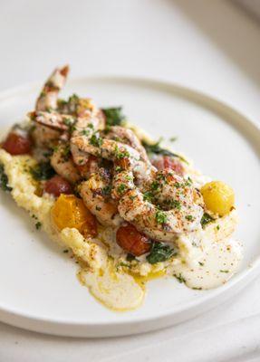 "Our" Shrimp & Grits
Parmesan polenta, sautéed spinach, blistered cherry tomatoes, Florida citrus butter