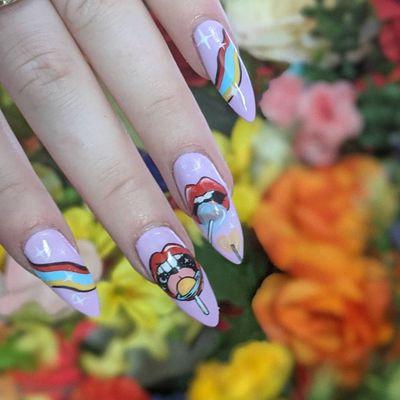 Hard gel extensions with tier 2 art.