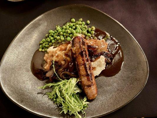 Boar sausage, potatoes, and peas