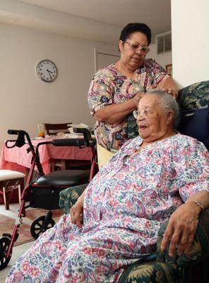 Taking care an older lady .