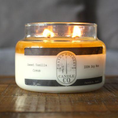 Burning sweet vanilla cream soy wax candle by Hayes Street Candle Company