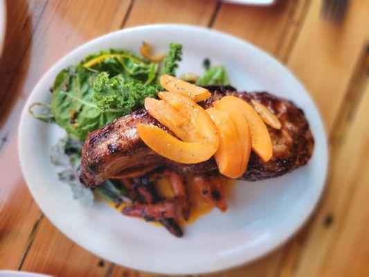 Patio smoked K-BBQ pork chop, apricots, roasted gochujang carrots, soy braised choy, kale chips.