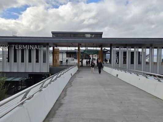 Across the Marion Street pedestrian bridge to the terminal