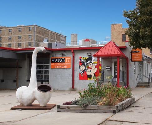 The outside of our building featuring a sculpture by local Kari Reardon.  We also have plenty of free off-street parking.