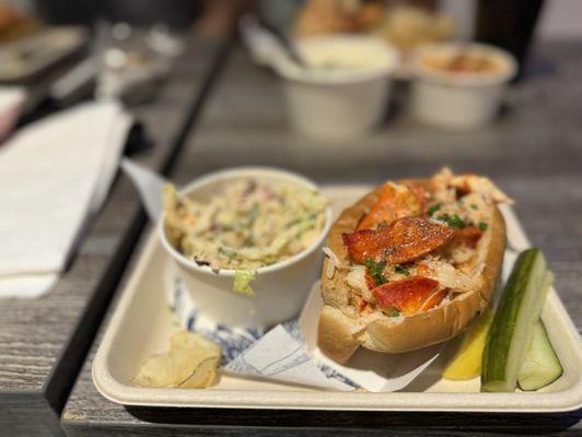 4oz warmed lobster roll with side of Cole slaw