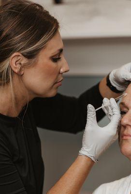 Professional injectable services by Board-Certified Nurse Practitioner Tarin Williams, MSN, APRN, FNP-BC at The Firm KC.