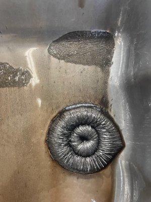 This is the transmission pan with the grime left over from months of gears wearing down