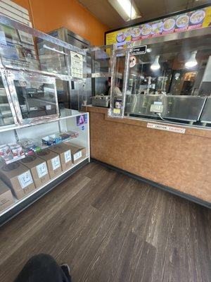 Counter and menu and the amazing people that served me my food.