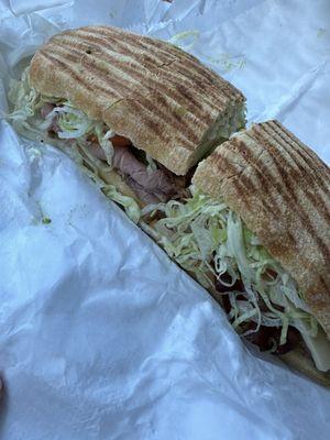 #34 Roast beef w horseradish sauce Swiss lettuce Tomato but on a panini instead of Rye