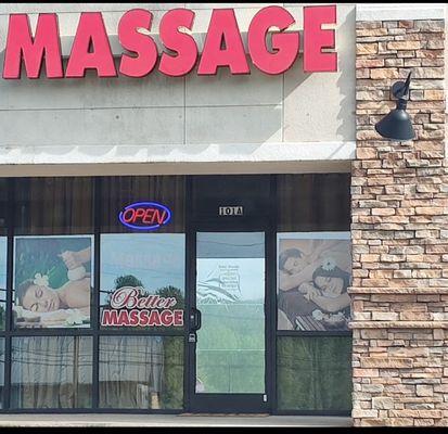 Front view of better massage next to Little Caesar' Pizza