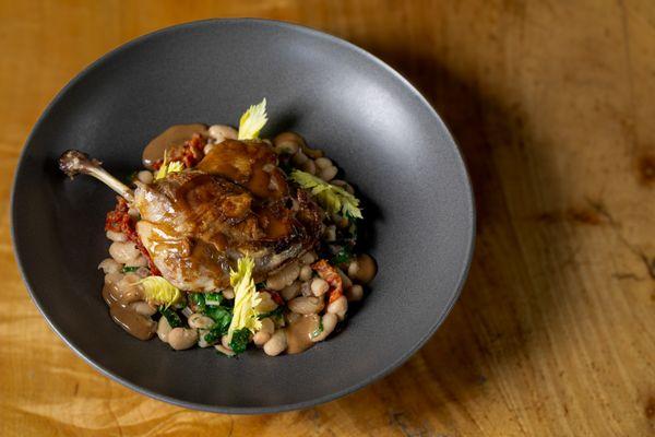 Crispy Duck
House confit duck leg, brandy-peppercorn sauce, and white bean ragout.