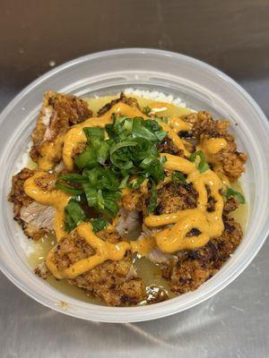 Mini Nashville chicken rice bowl. Has gravy and Nash sauce. Garlic butter Rice is delicious.