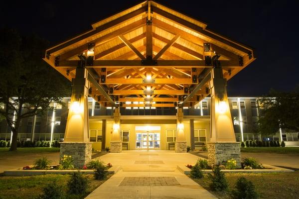 Creekview's new portico lit up at night!