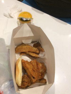 2 pieces dark with fries, honey mustard sauce, and half a roll, $9.