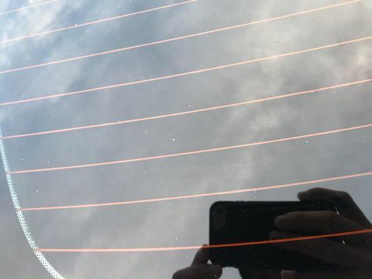 Dirt on the window under tint