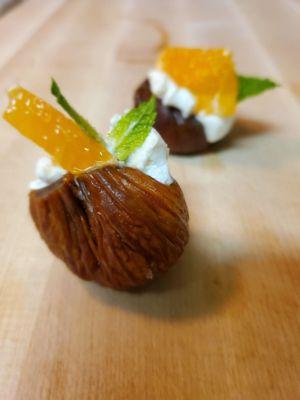 Turkish Figs filled with Honey Goat Cheese , Crowned with fresh Mediterranean Citrus and Mint
