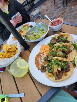 Steak tacos and chips and guac.