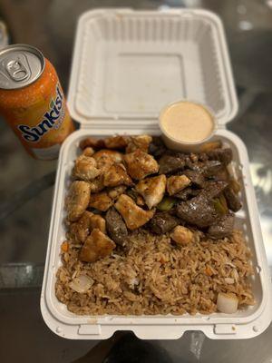 Chicken and steak enteee with fried rice
