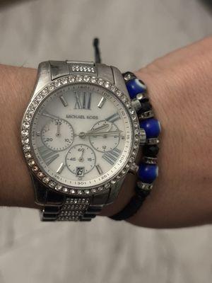 Love the size of this watch and have received many compliments on it. This store has a great selection on men's and women's watches!