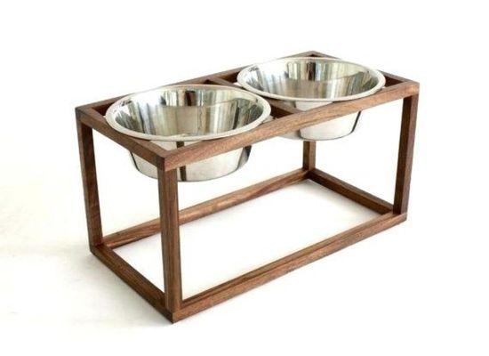 Modern dog feeder handcrafted from solid black walnut. Minimal, open design elevates the dish to a comfortable feeding height for your pet.