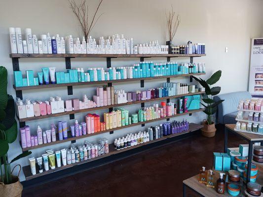 Inviting waiting area, full of products. Clean and organized!