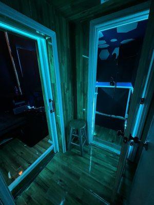 Blue light entrance with door open.