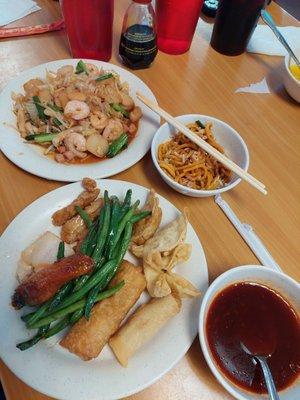 Mongolian BBQ upper left, various items from buffet. (Peanut chicken is really good)